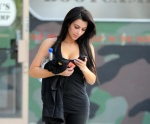 young-woman-texting-while-walking